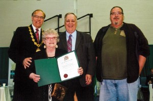Sustainable Peterborough Coordinating Committee Members receiving award from Mayor