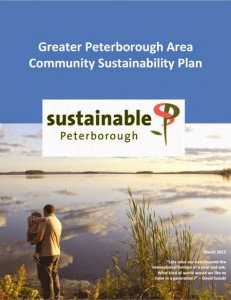 Cover of the March 2012 Greater Peterborough Area Community Sustainability Plan, depicting a parent and child standing at the water's edge of a local freshwater lake 